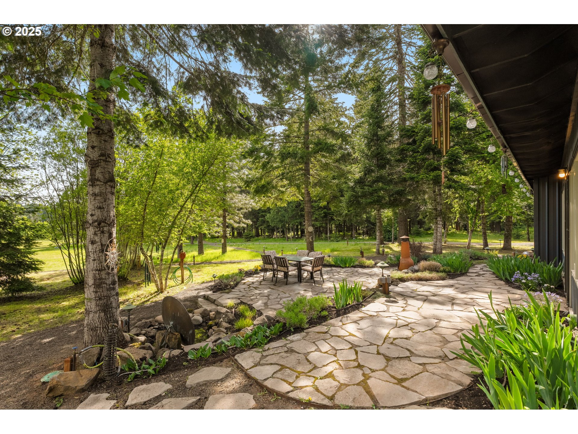 961 Snowden Road White Salmon, WA 98672 - Photo 22 of 48 a view of a yard with plants and trees