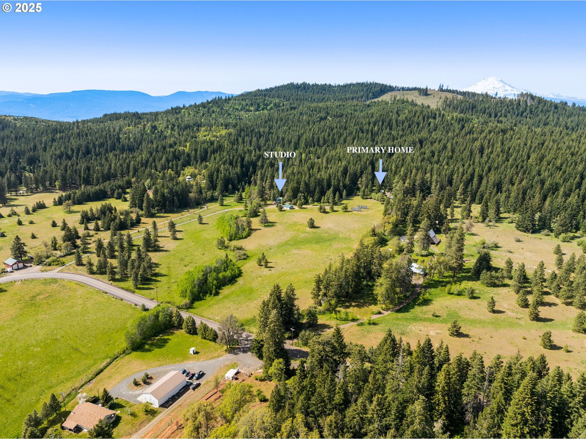 961 Snowden Road White Salmon, WA 98672 - Photo 32 of 48 a view of a houses with a yard