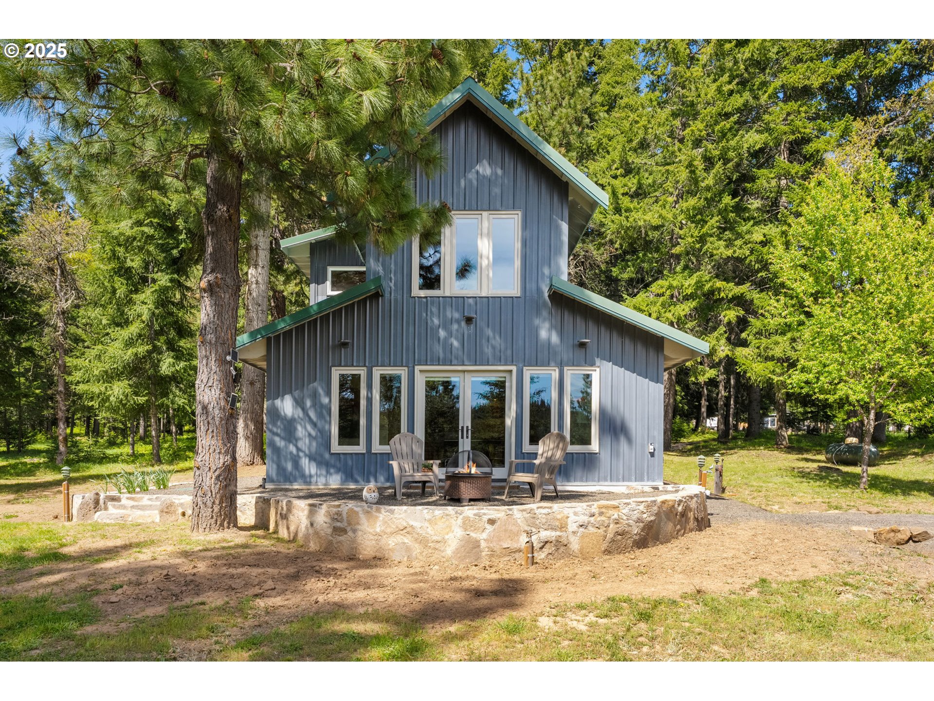961 Snowden Road White Salmon, WA 98672 - Photo 33 of 48 a view of a house with a yard
