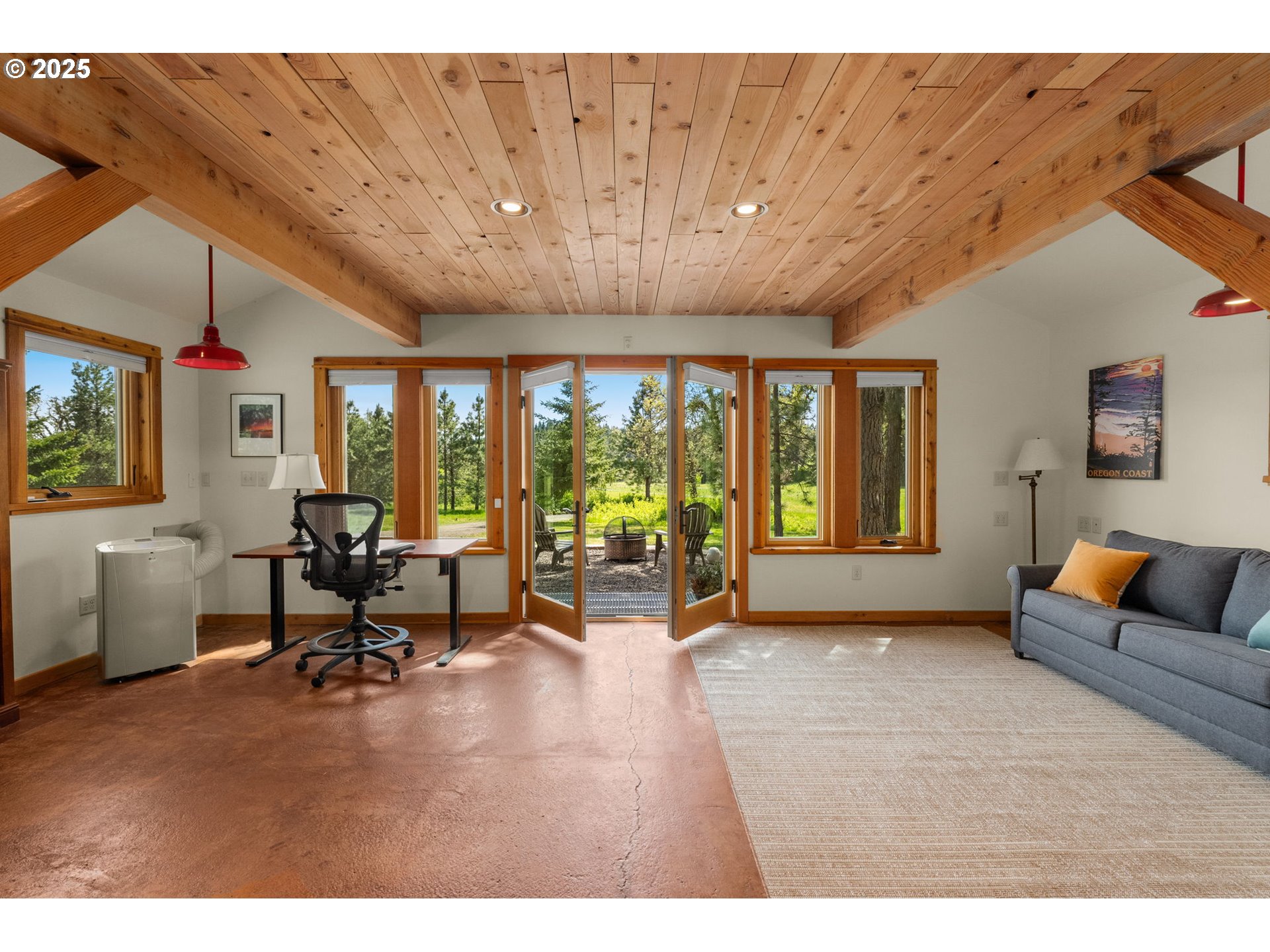 961 Snowden Road White Salmon, WA 98672 - Photo 34 of 48 a living room with furniture and large windows