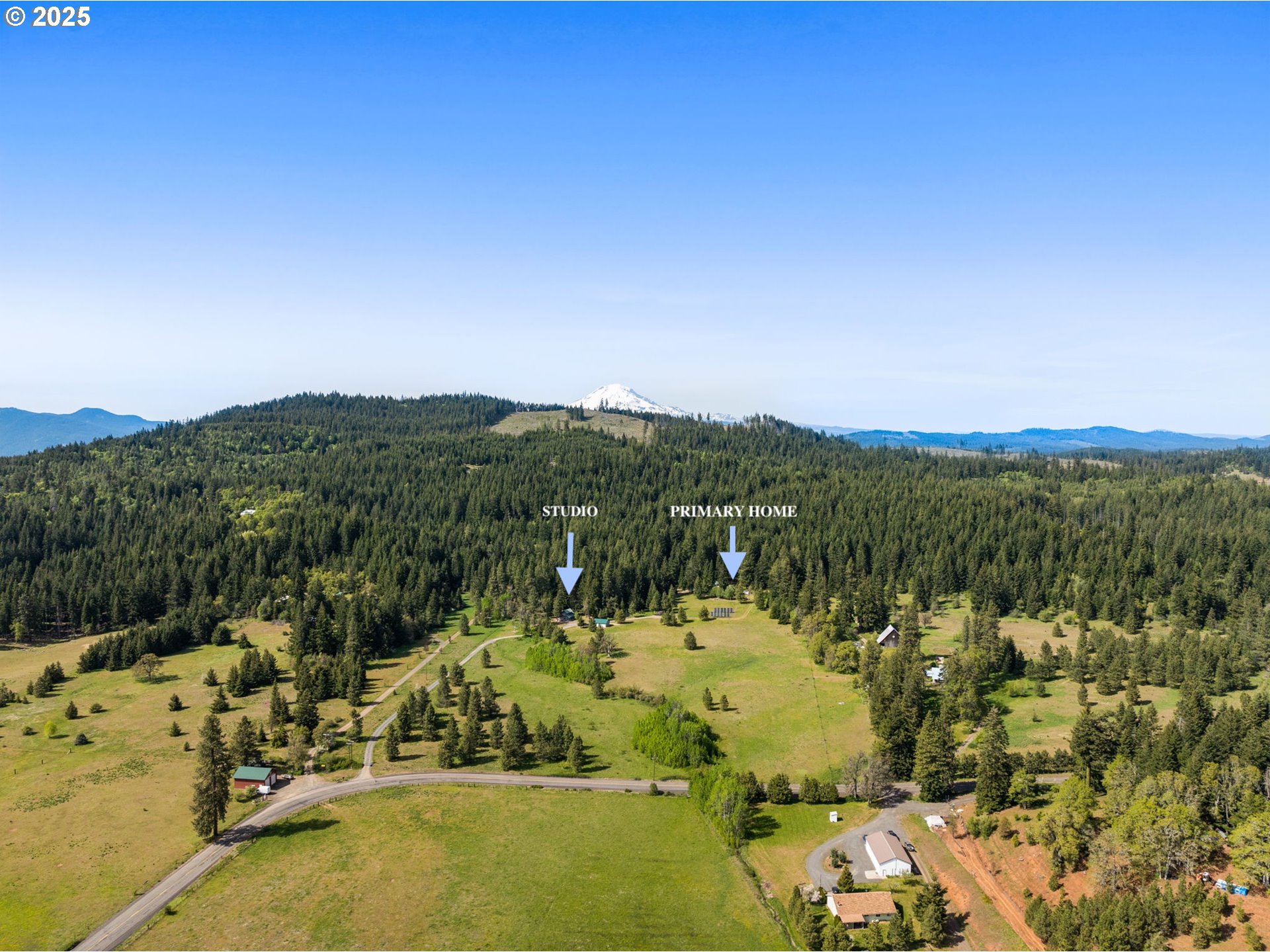 961 Snowden Road White Salmon, WA 98672 - Photo 40 of 48 a view of a lake with houses