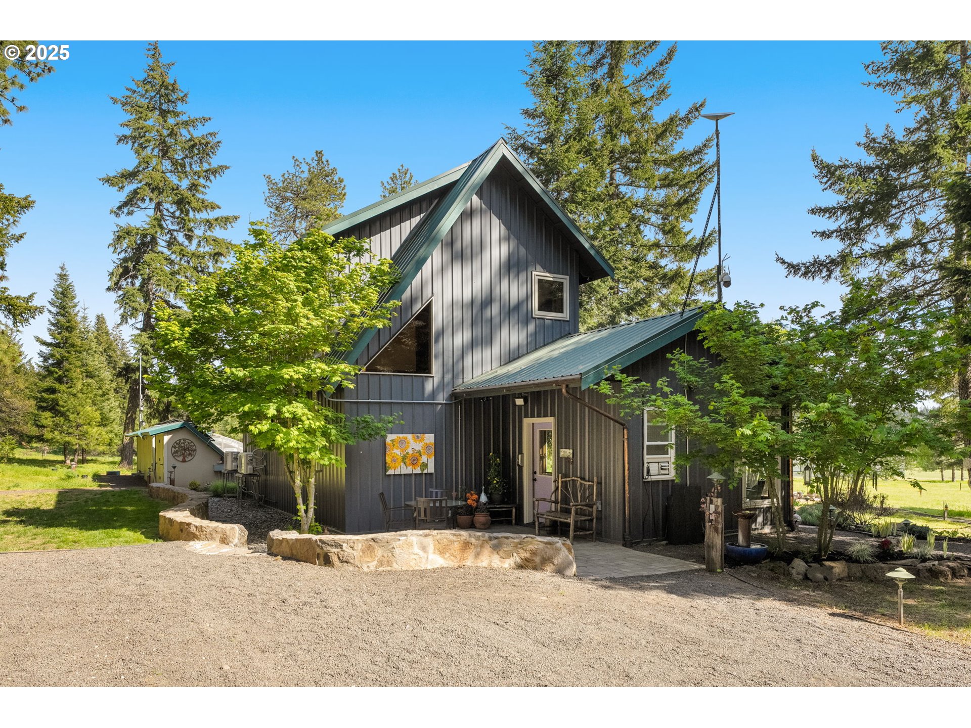 961 Snowden Road White Salmon, WA 98672 - Photo 4 of 48 a backyard of a house with lots of green space