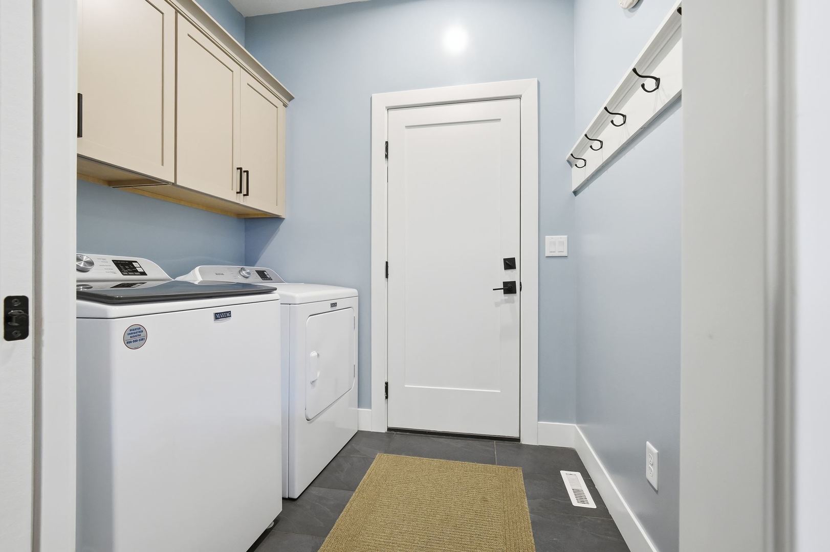 1216 Granite Way Normal, IL 61761 - Photo 19 of 33 a view of a storage and utility room with washer and dryer