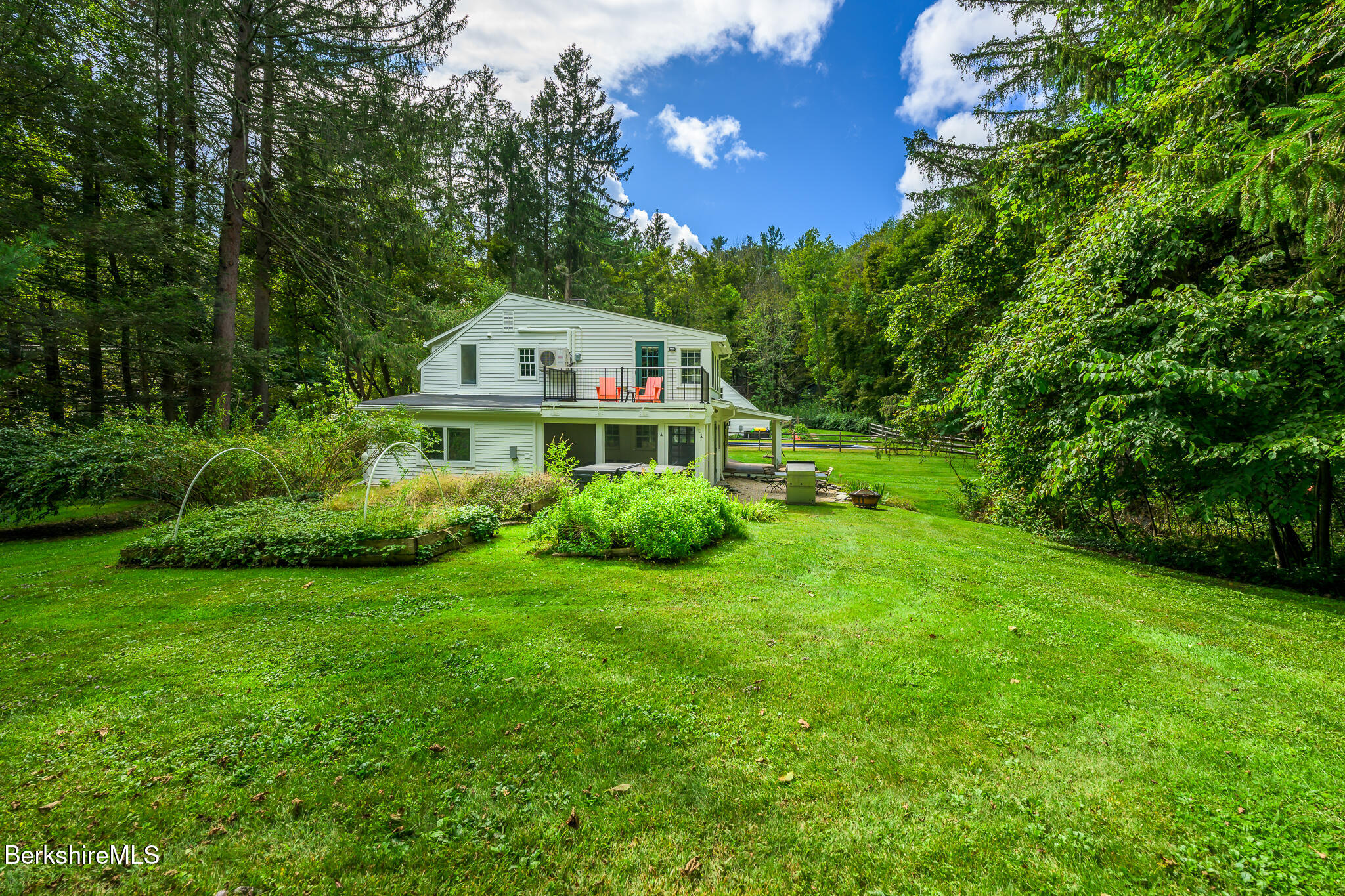 270 Hillsdale Road Egremont, MA 01230 - Photo 5 of 39 a front view of a house with a yard