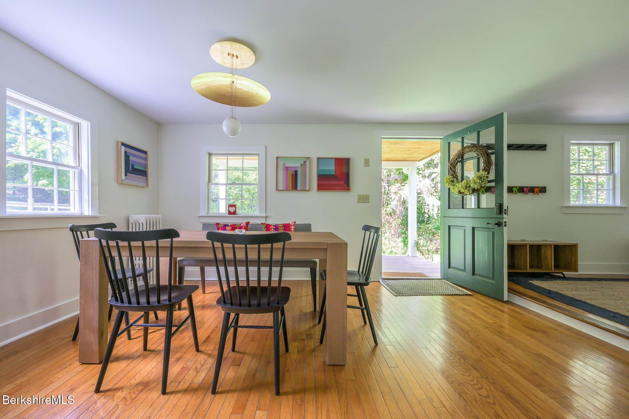 270 Hillsdale Road Egremont, MA 01230 - Photo 9 of 39 a view of a dining room with furniture and a floor to ceiling window