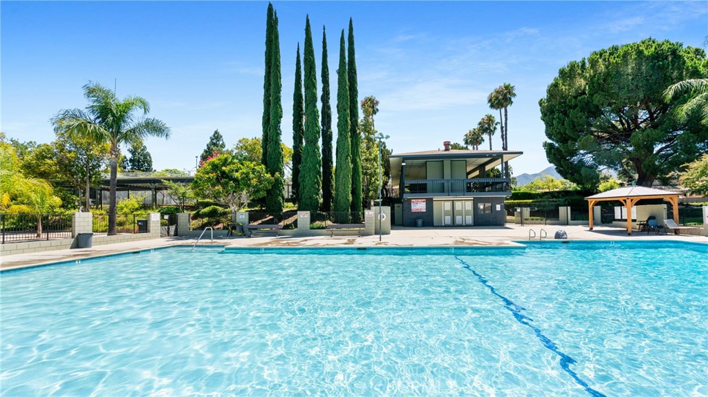 1598 Border Avenue, Unit H Corona, CA 92882 - Photo 29 of 37 a view of a house with a yard and sitting area