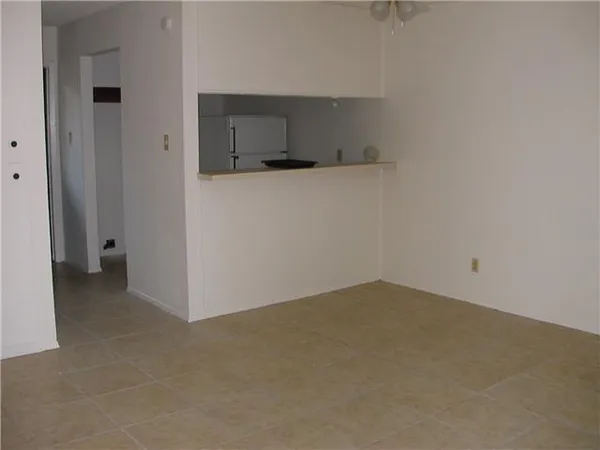 an empty room with cabinet