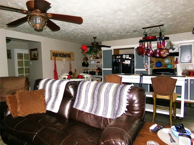 a bed room with a bed furniture and a chandelier