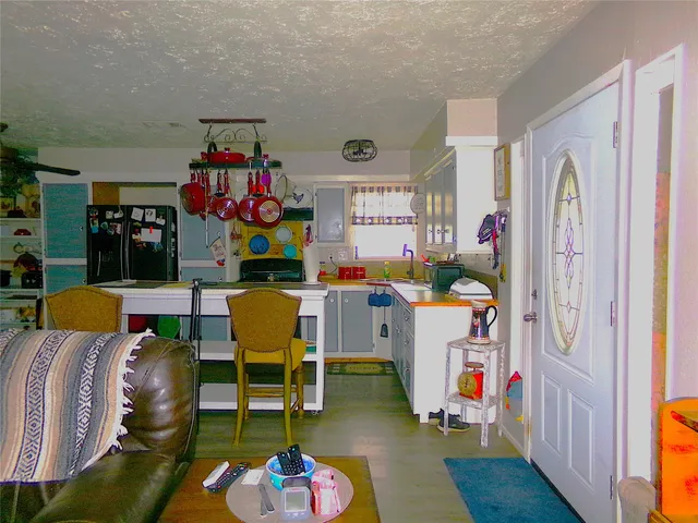 a living room filled with furniture and a couch