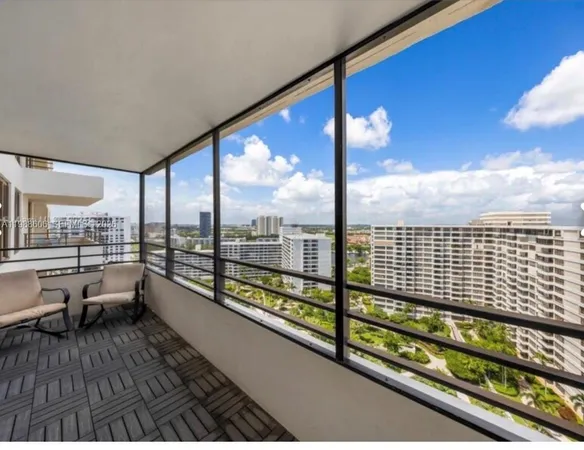 a view of roof deck with furniture