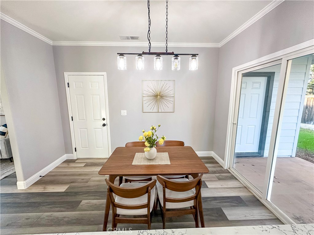 16 Tierra Rosa Lane Chico, CA 95973 - Photo 15 of 43 a view of a dining room with furniture and chandelier