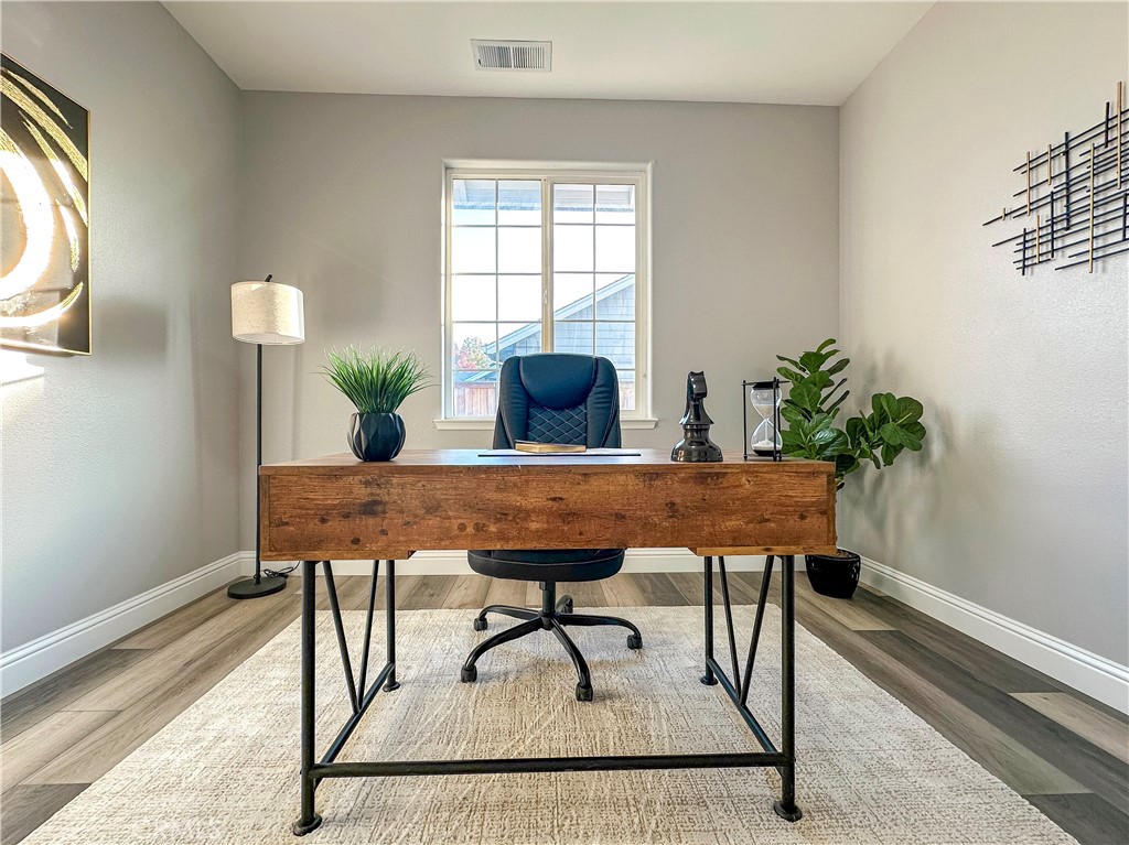 16 Tierra Rosa Lane Chico, CA 95973 - Photo 25 of 43 a view of a dining room with furniture and wooden floor