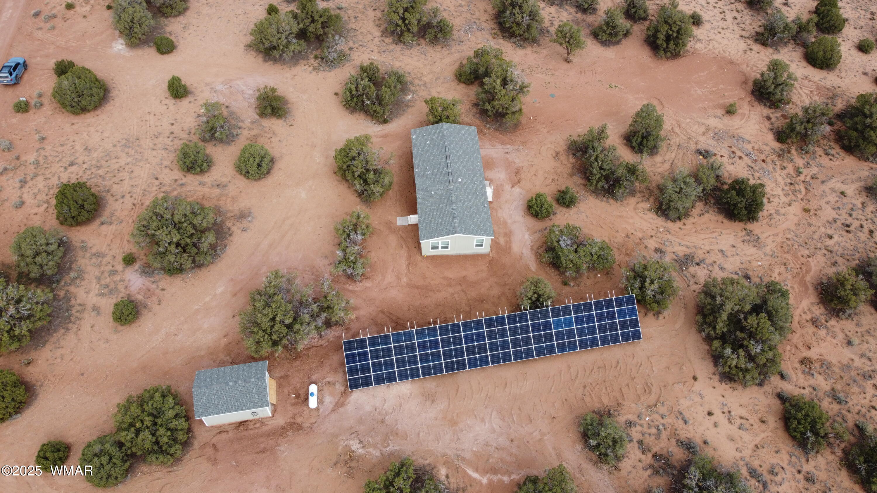 4129 Apache Road Snowflake, AZ 85937 - Photo 2 of 48 an aerial view of a backyard of a house