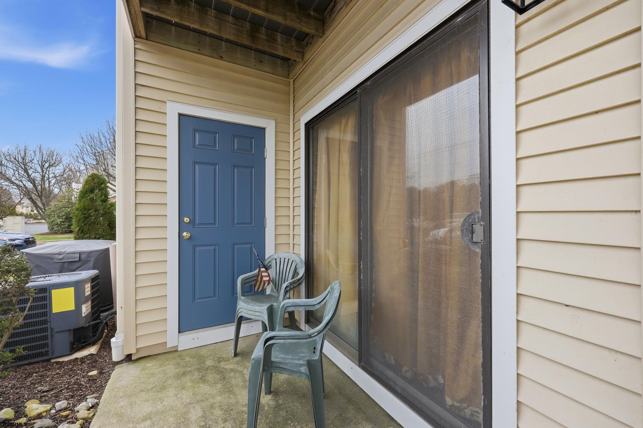 598 Mays Landing Road, Unit 202 Somers Point, NJ 08244 - Photo 18 of 23 a view of chair and fire pit in an outdoor space