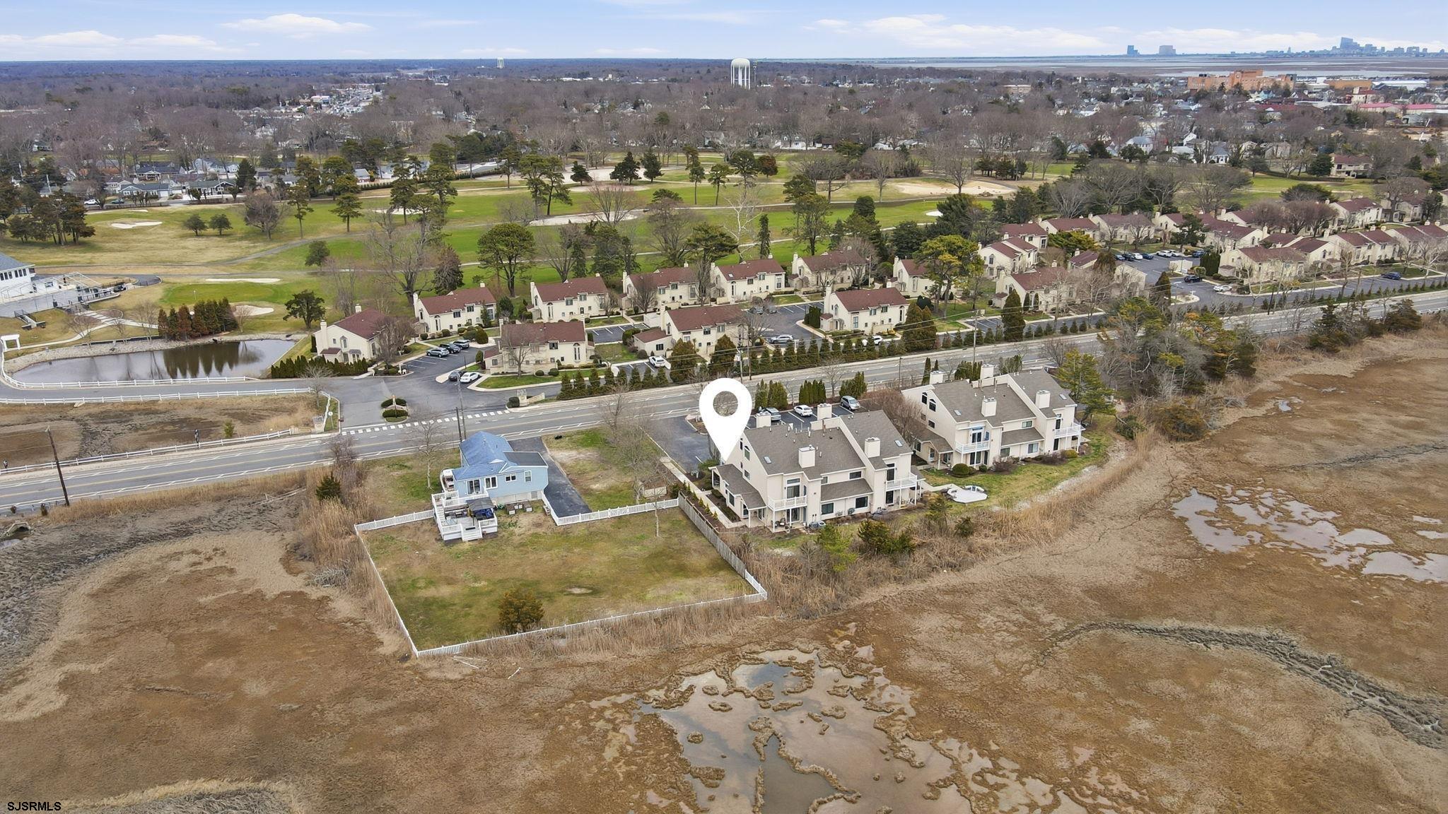 598 Mays Landing Road, Unit 202 Somers Point, NJ 08244 - Photo 19 of 23 an aerial view of residential house with outdoor space and river