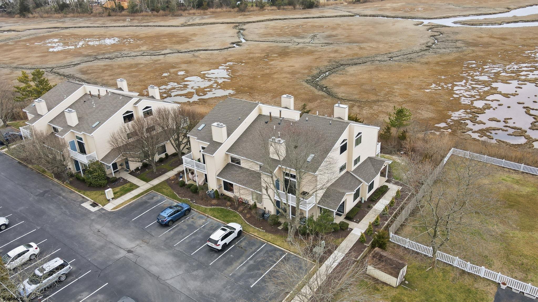 598 Mays Landing Road, Unit 202 Somers Point, NJ 08244 - Photo 22 of 23 a view of roof with city view