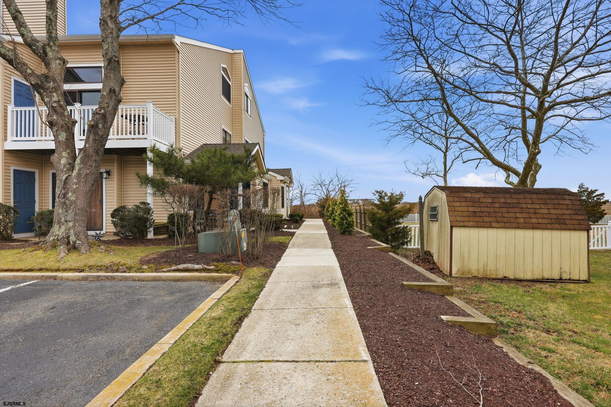 598 Mays Landing Road, Unit 202 Somers Point, NJ 08244 - Photo 3 of 23 a view of a street with houses