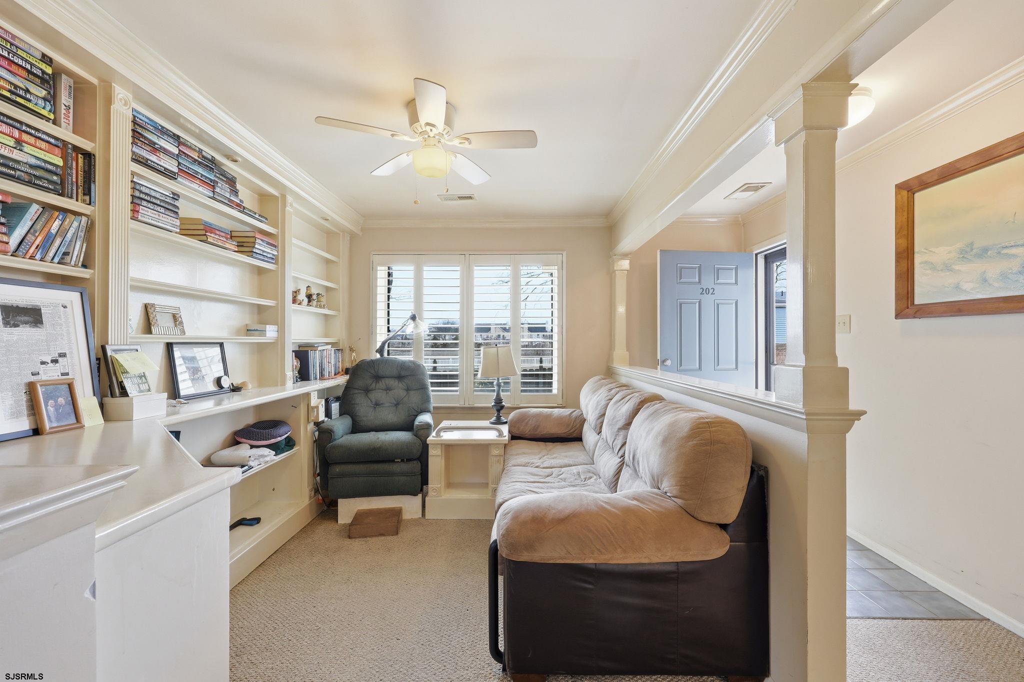 598 Mays Landing Road, Unit 202 Somers Point, NJ 08244 - Photo 5 of 23 a living room with furniture and a large window