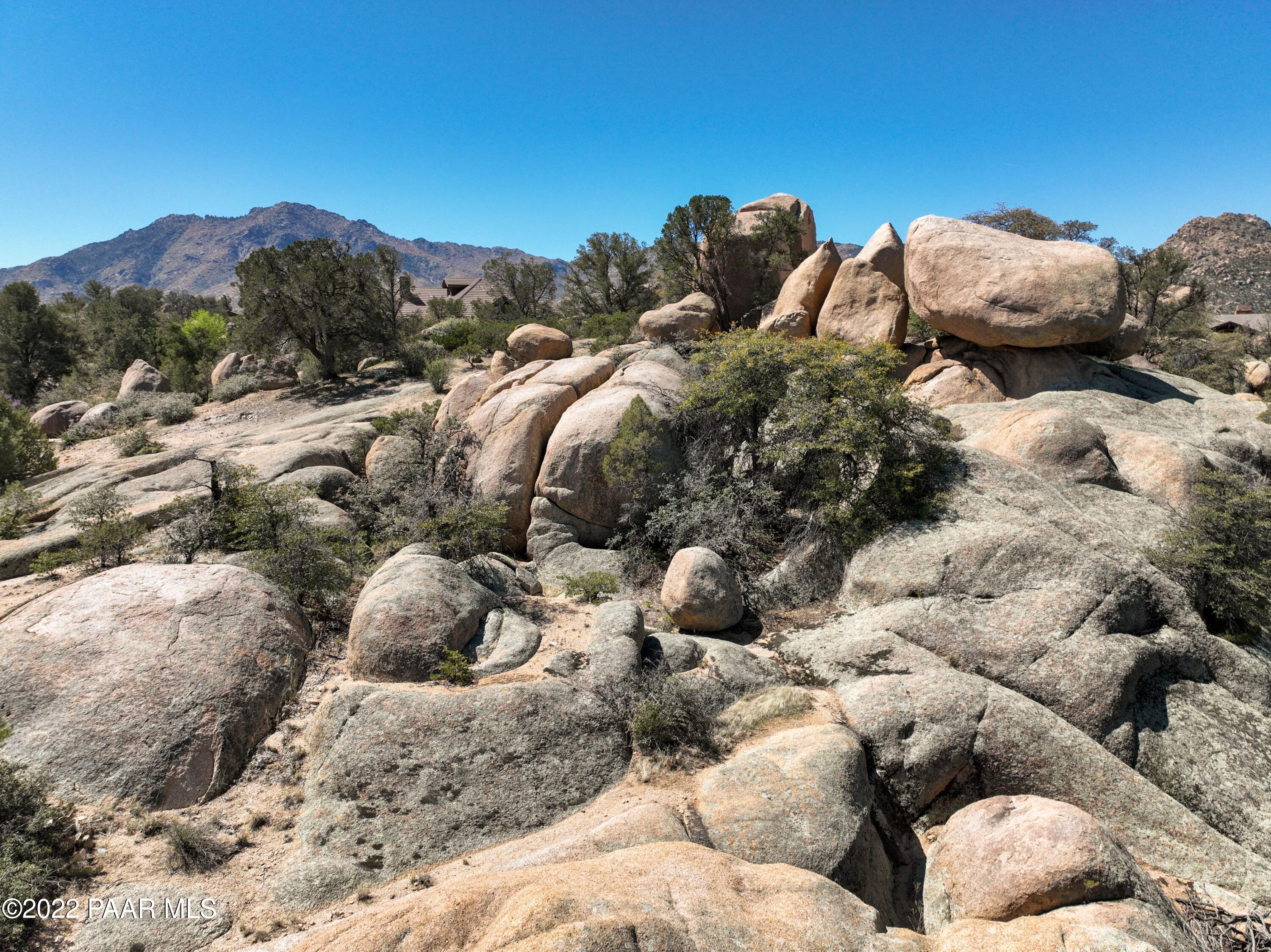 9970 Clear Fork Road Prescott, AZ 86305 - Photo 21 of 23 a view of a mountain with a yard