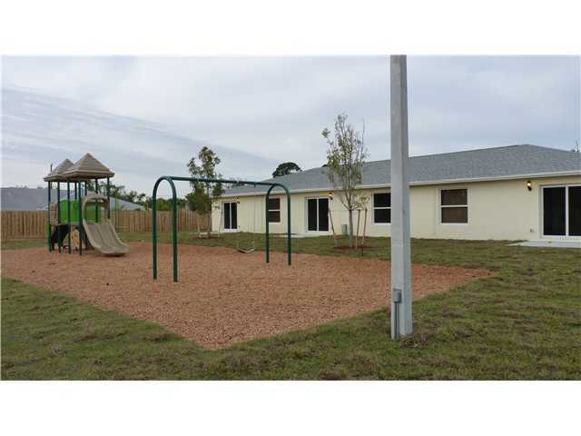 4525 Mathis Street Lake Worth, FL 33461 - Photo 2 of 8 a black and white photo of a house