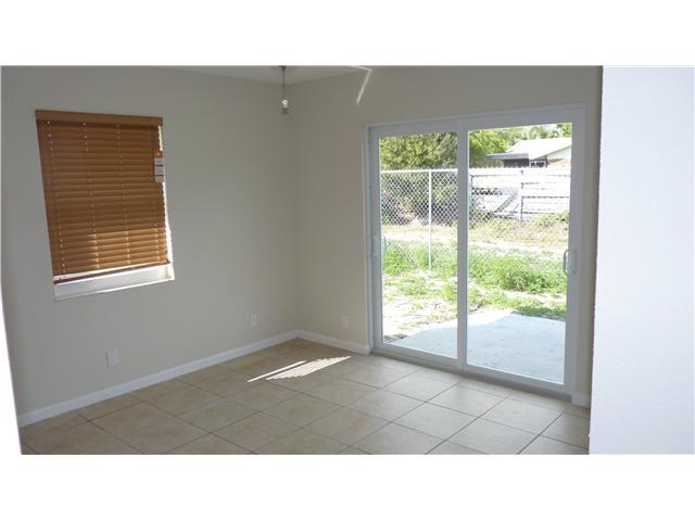 4525 Mathis Street Lake Worth, FL 33461 - Photo 5 of 8 a open hall with a window