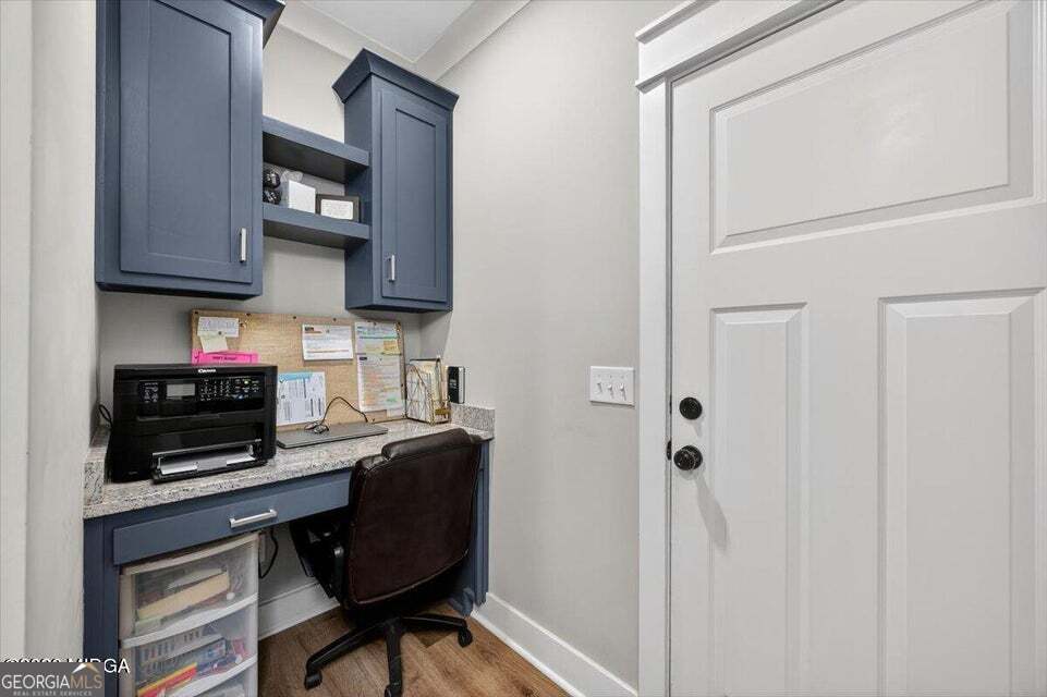 303 Tuxedo Circle Forsyth, GA 31029 - Photo 15 of 45 a kitchen with stainless steel appliances granite countertop a stove and a refrigerator