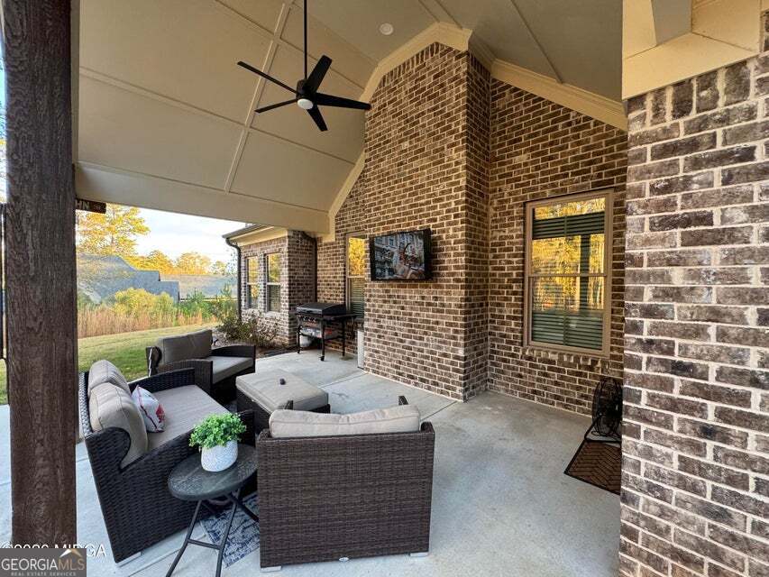 303 Tuxedo Circle Forsyth, GA 31029 - Photo 26 of 45 a view of balcony with furniture