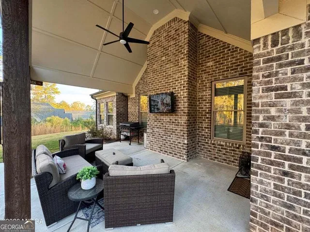 a view of balcony with furniture