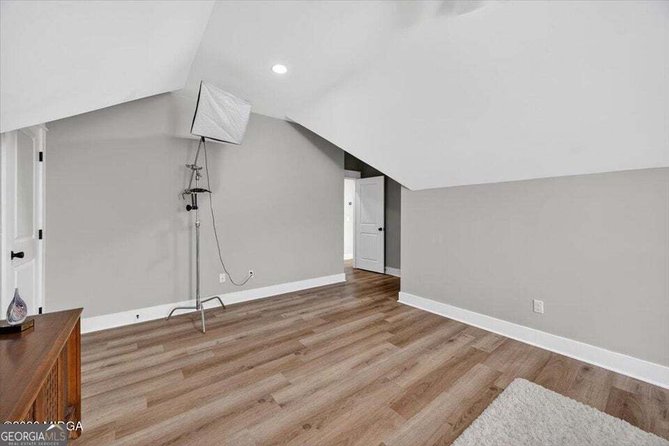 303 Tuxedo Circle Forsyth, GA 31029 - Photo 34 of 45 a view of an empty room with wooden floor