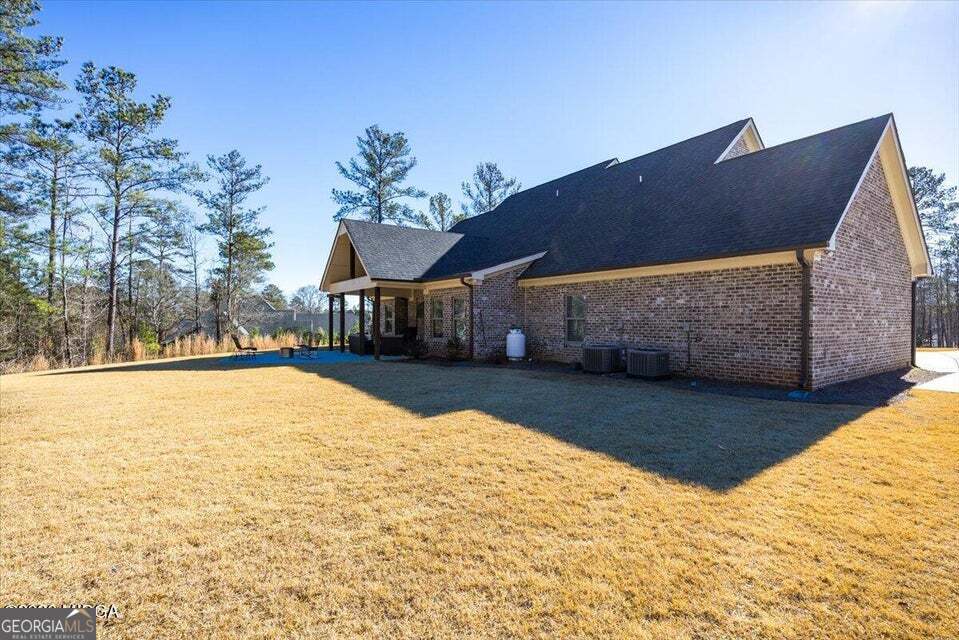 303 Tuxedo Circle Forsyth, GA 31029 - Photo 44 of 45 a view of outdoor space yard and swimming pool