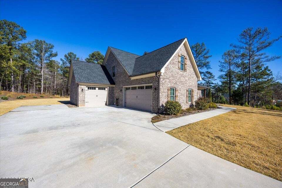 303 Tuxedo Circle Forsyth, GA 31029 - Photo 45 of 45 a view of a house with basketball court