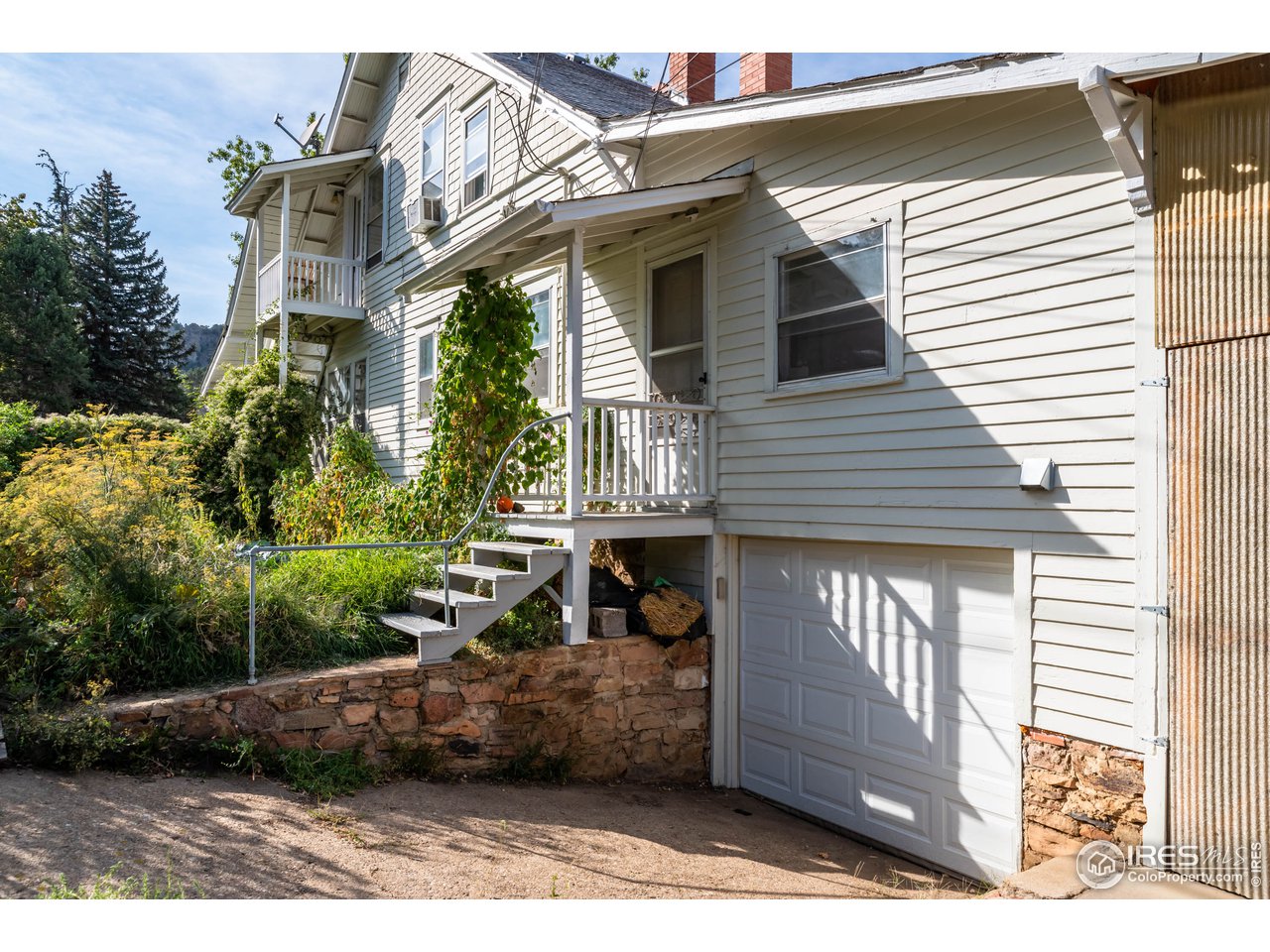 2430 4th Street Boulder, CO 80304 - Photo 21 of 24 Side Yard with Garage