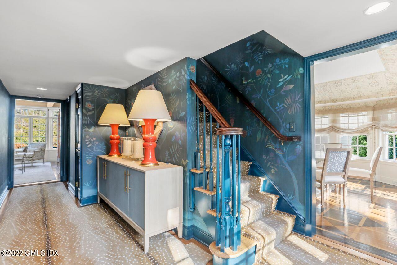 415 Round Hill Road Greenwich, CT 06831 - Photo 15 of 36 a view of living room kitchen and entryway