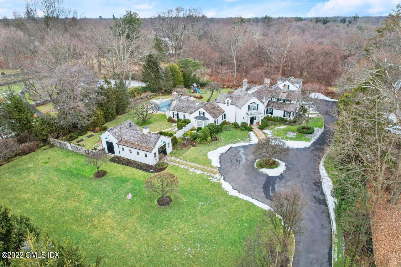 415 Round Hill Road Greenwich, CT 06831 - Photo 2 of 36 an aerial view of a house with outdoor space