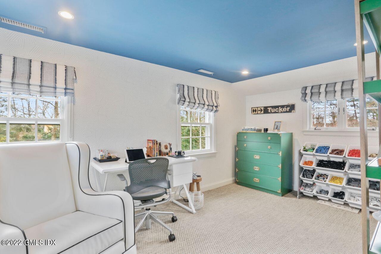 415 Round Hill Road Greenwich, CT 06831 - Photo 22 of 36 a workspace with furniture and a window