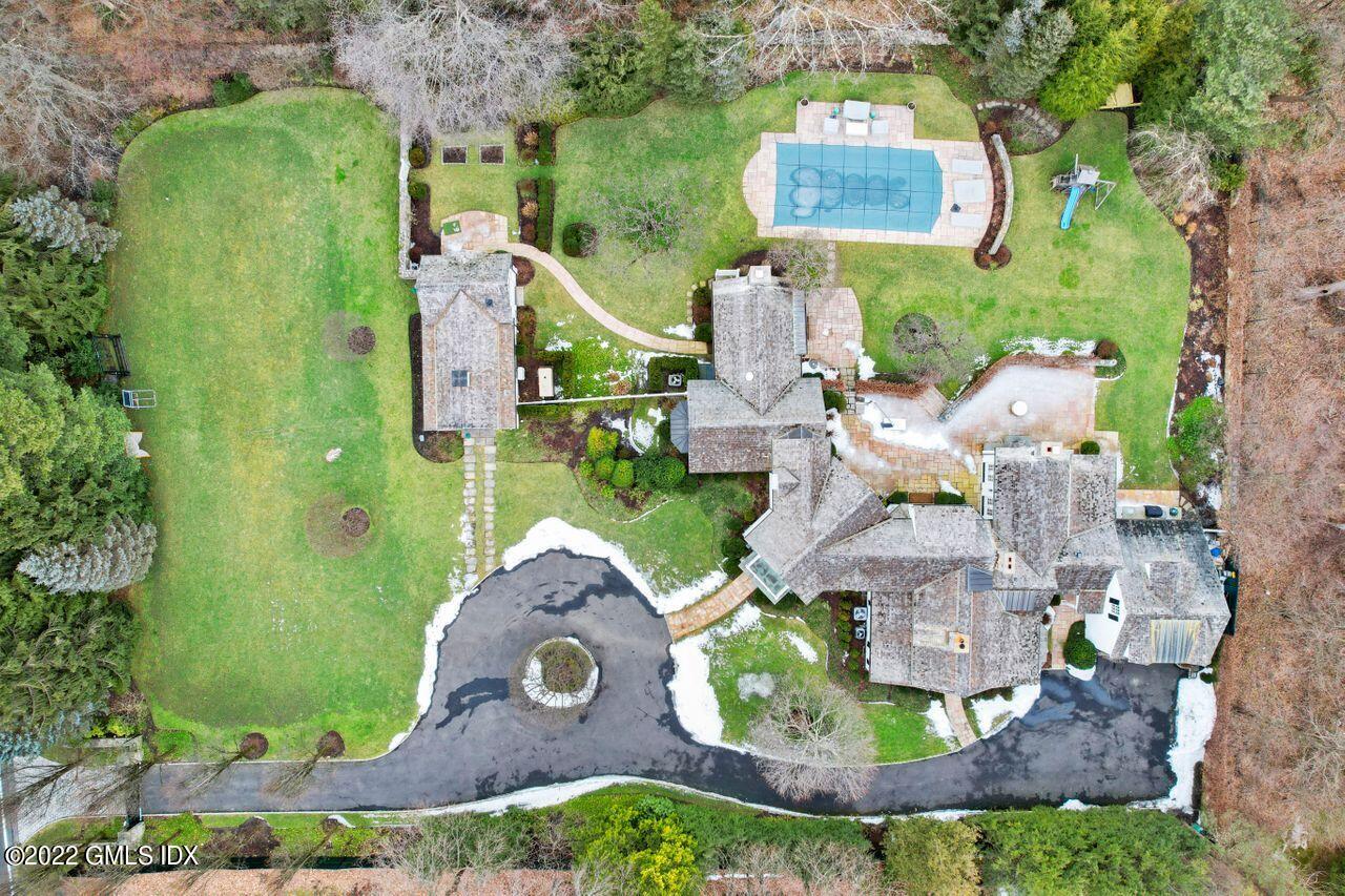 415 Round Hill Road Greenwich, CT 06831 - Photo 32 of 36 an aerial view of a house with outdoor space
