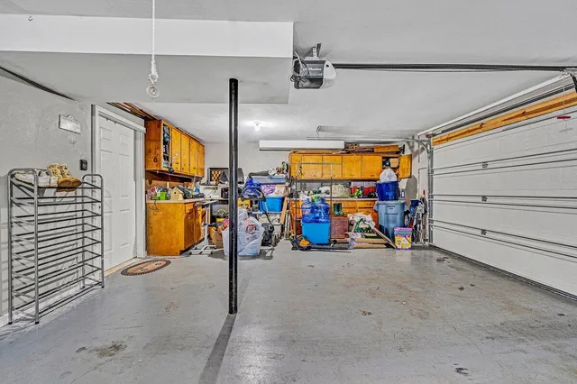 a view of a garage with storage