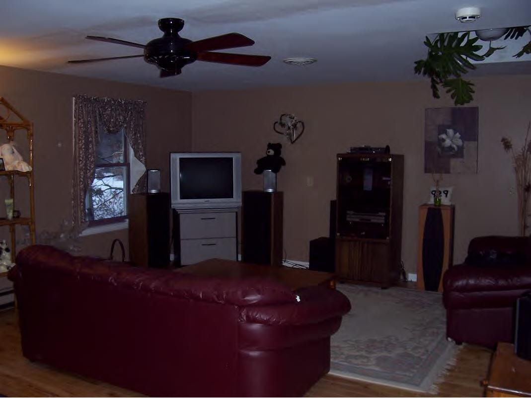 158 Bunce Road South Sheffield, MA 01222 - Photo 5 of 6 a living room with furniture and a flat screen tv