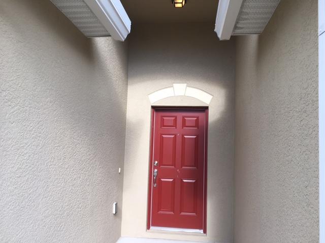 231 Southwest Homeland Road Port St. Lucie, FL 34953 - Photo 8 of 11 Front