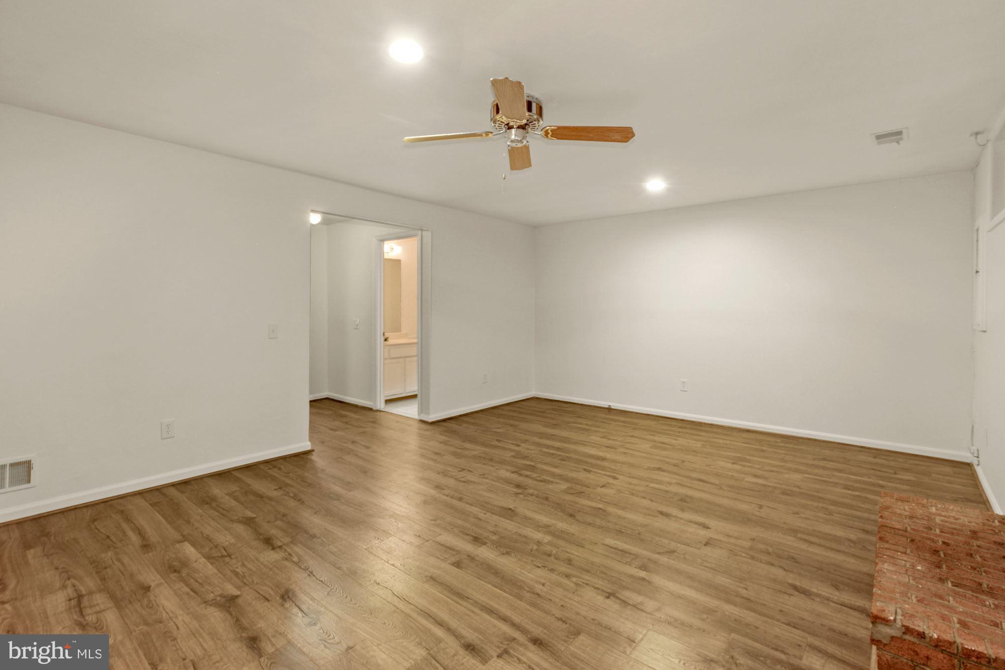 214 Finale Terrace Silver Spring, MD 20901 - Photo 22 of 32 RENOVATED BASEMENT/FAMILY ROOM