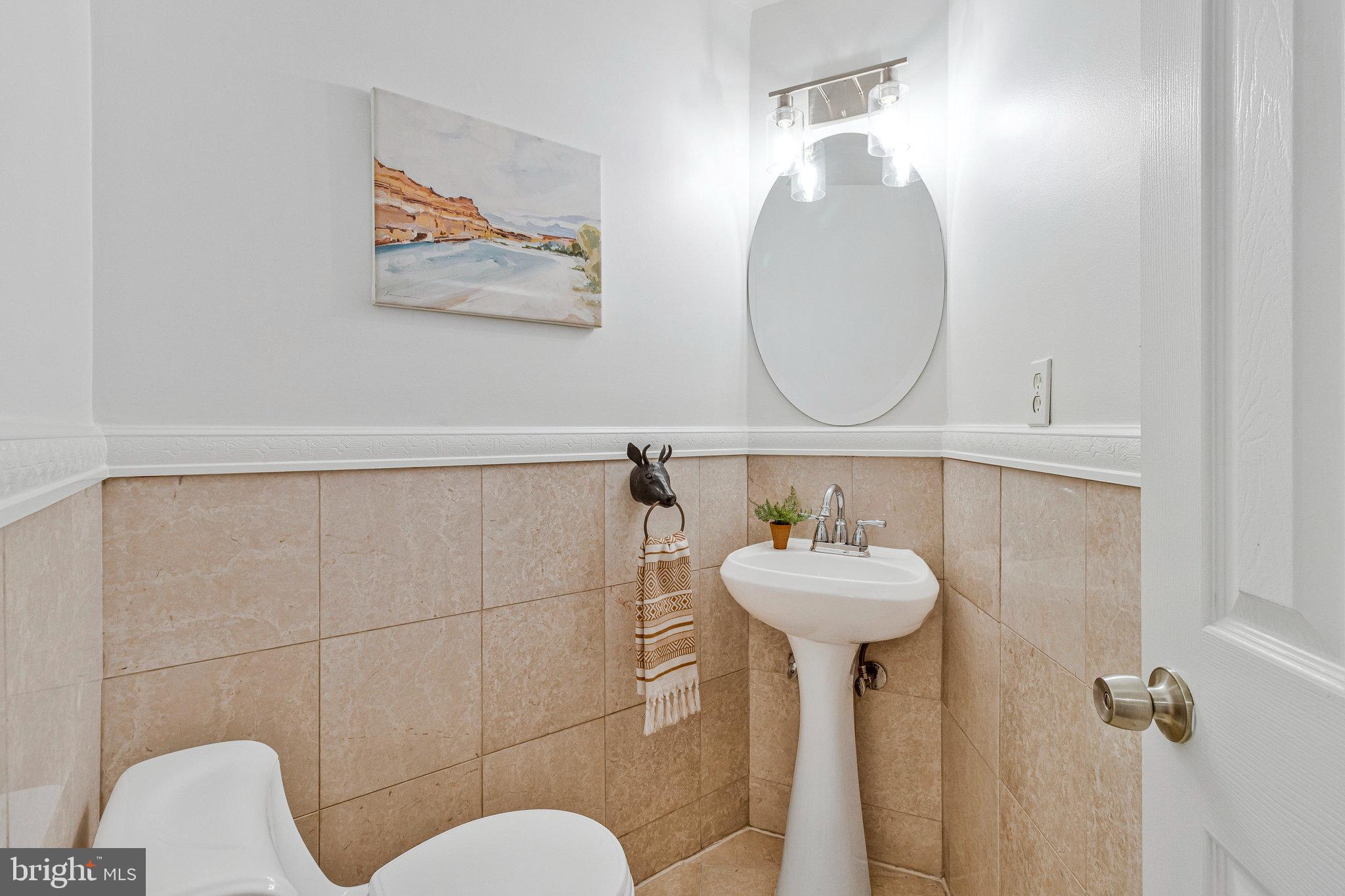 1221 Duncan Place Northeast Washington, DC 20002 - Photo 5 of 24 Half bath btwn LR and kitchen on the first floor