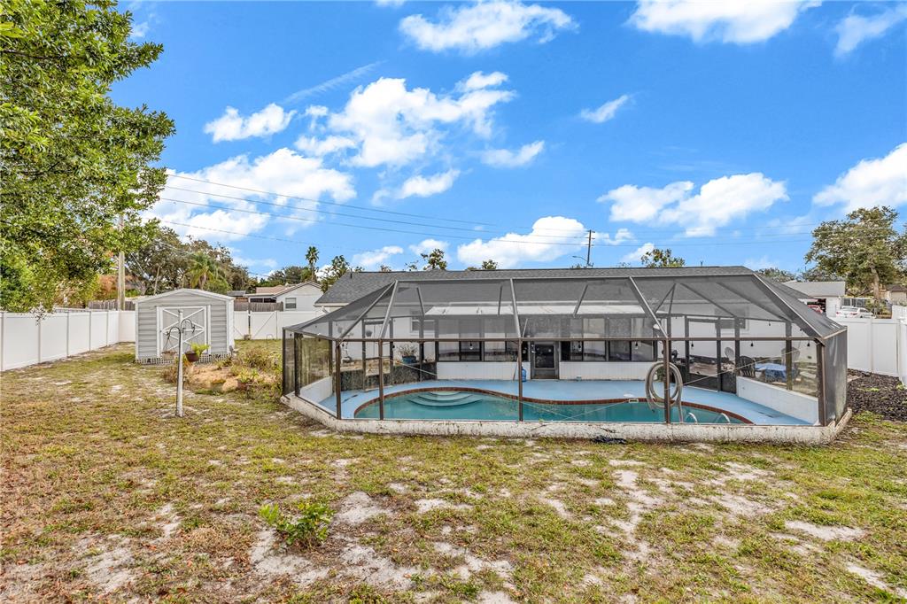 1186 Azora Drive Deltona, FL 32725 - Photo 18 of 24 a view of a house with a yard