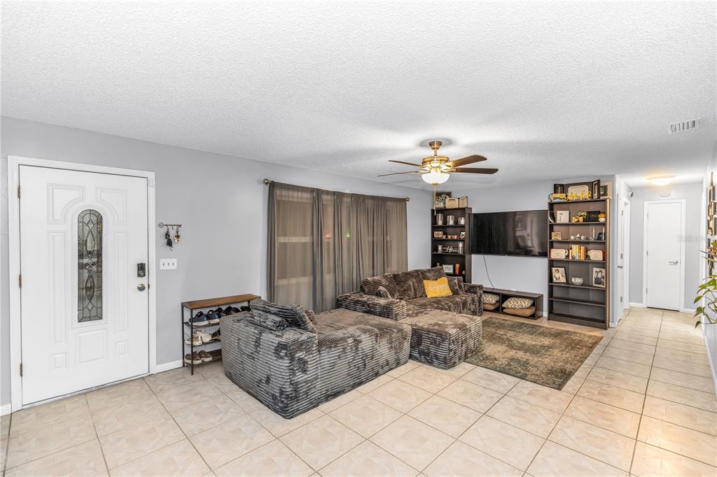 1186 Azora Drive Deltona, FL 32725 - Photo 6 of 24 a living room with furniture