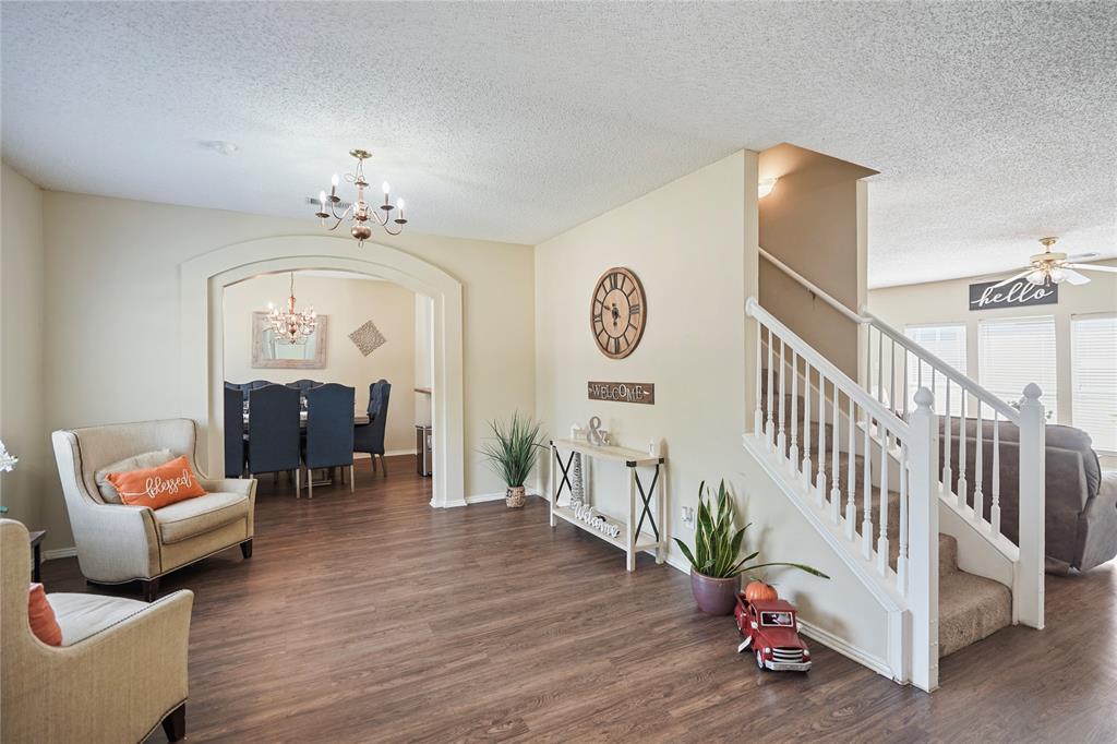1934 Pin Oak Lane Lancaster, TX 75146 - Photo 5 of 27 a living room with furniture flowerpot and wooden floor