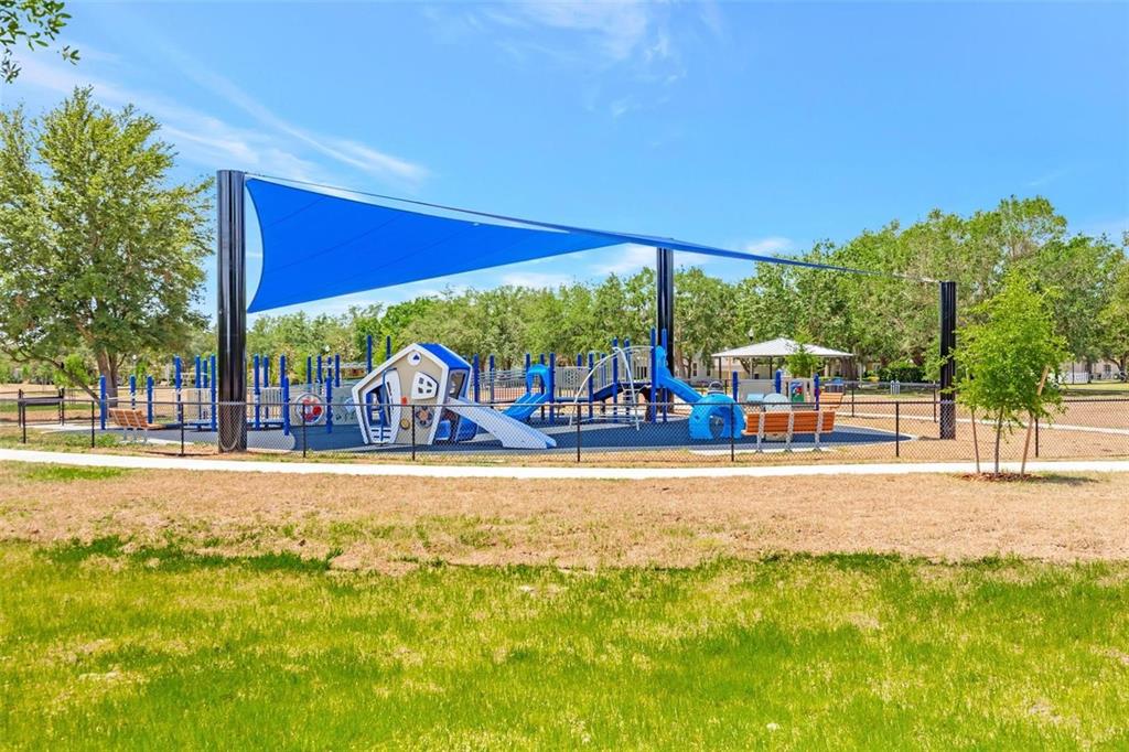 7621 Sutherton Lane Windermere, FL 34786 - Photo 11 of 15 a view of a house with a yard and sitting area