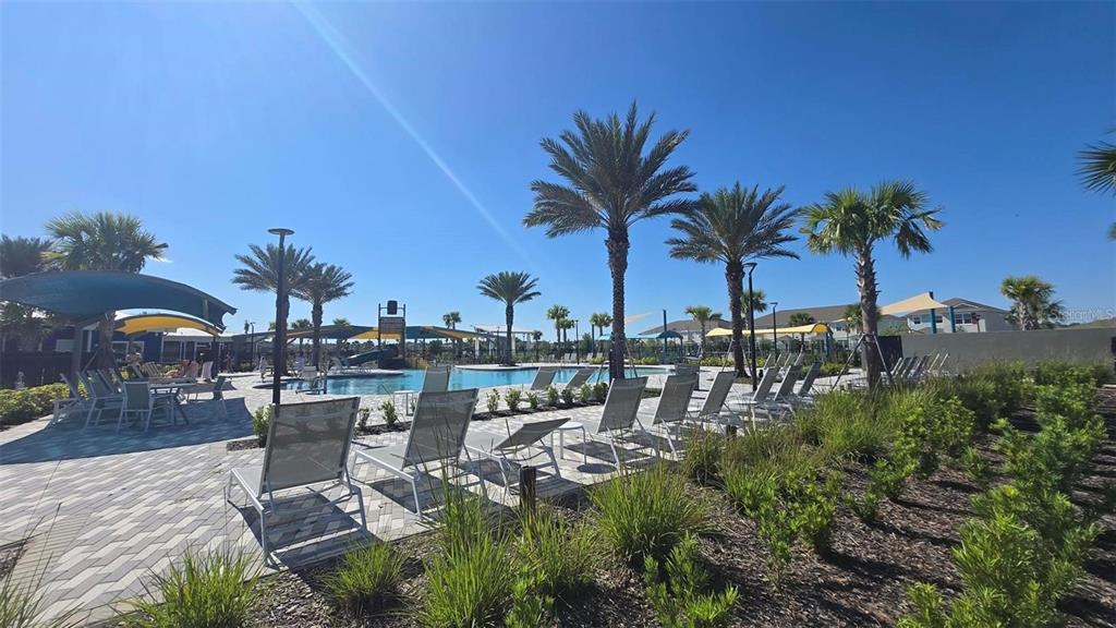 7621 Sutherton Lane Windermere, FL 34786 - Photo 6 of 15 a view of a chair and tables in patio