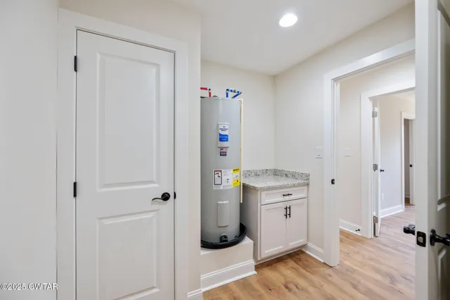 a view of kitchen and utility room