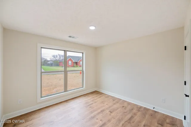 an empty room with window