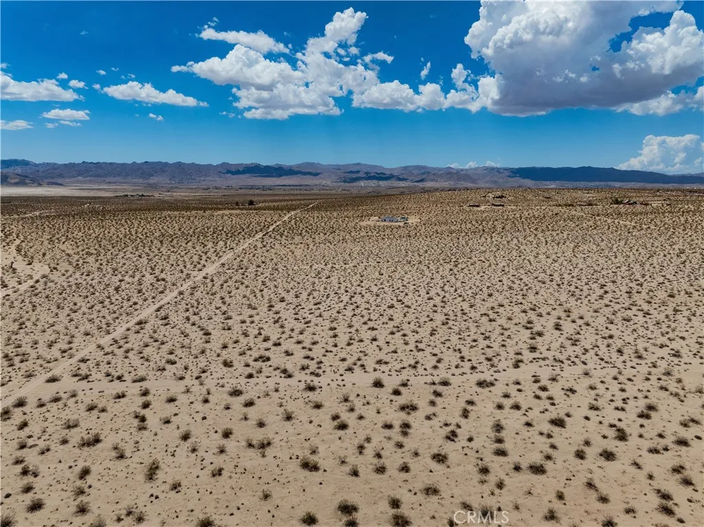 63840 Desert Lilly Road Joshua Tree, CA 92252 - Photo 11 of 34 a view of a room with a bench