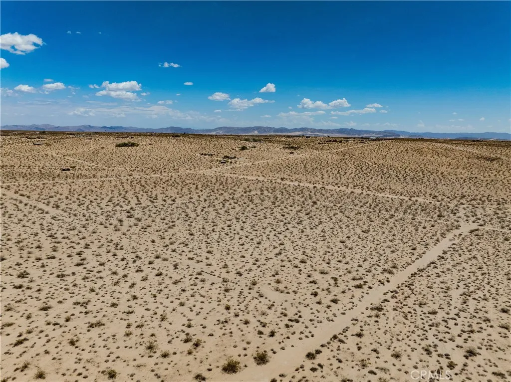 63840 Desert Lilly Road Joshua Tree, CA 92252 - Photo 15 of 34 a view of a pathway with a lake